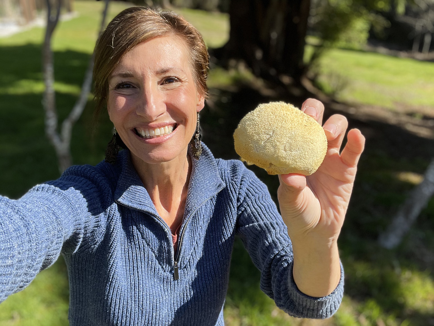 Nicole Apelian holding Lion's Mane Mushroom