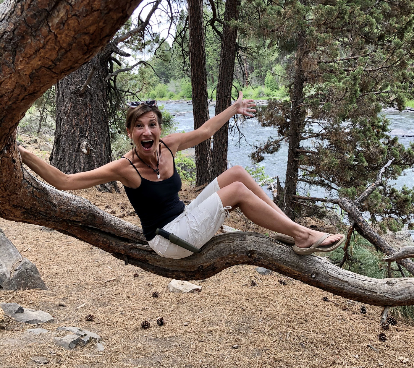 Nicole Apelian playing in tree