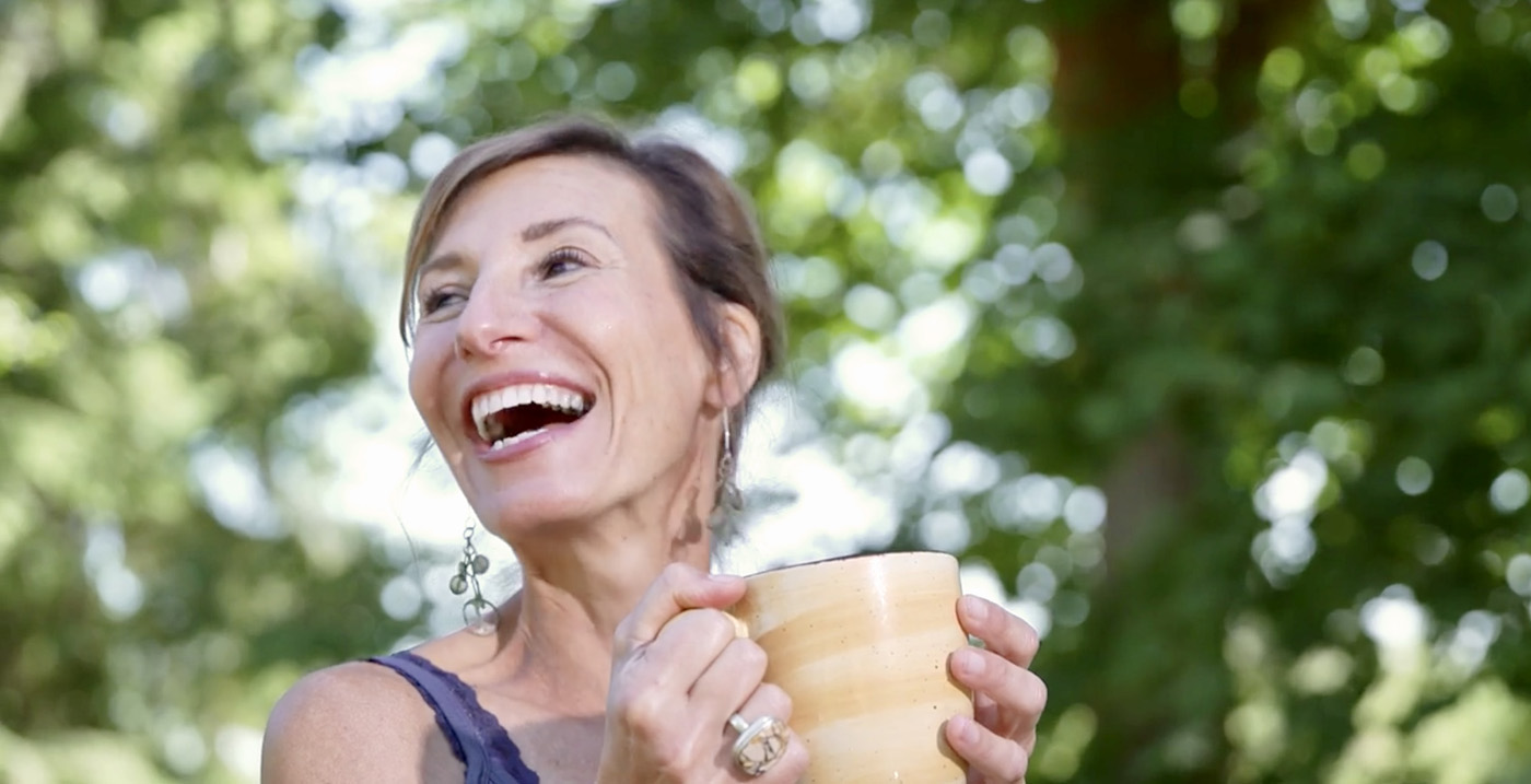 Nicole Apelian with mug of herbal tea