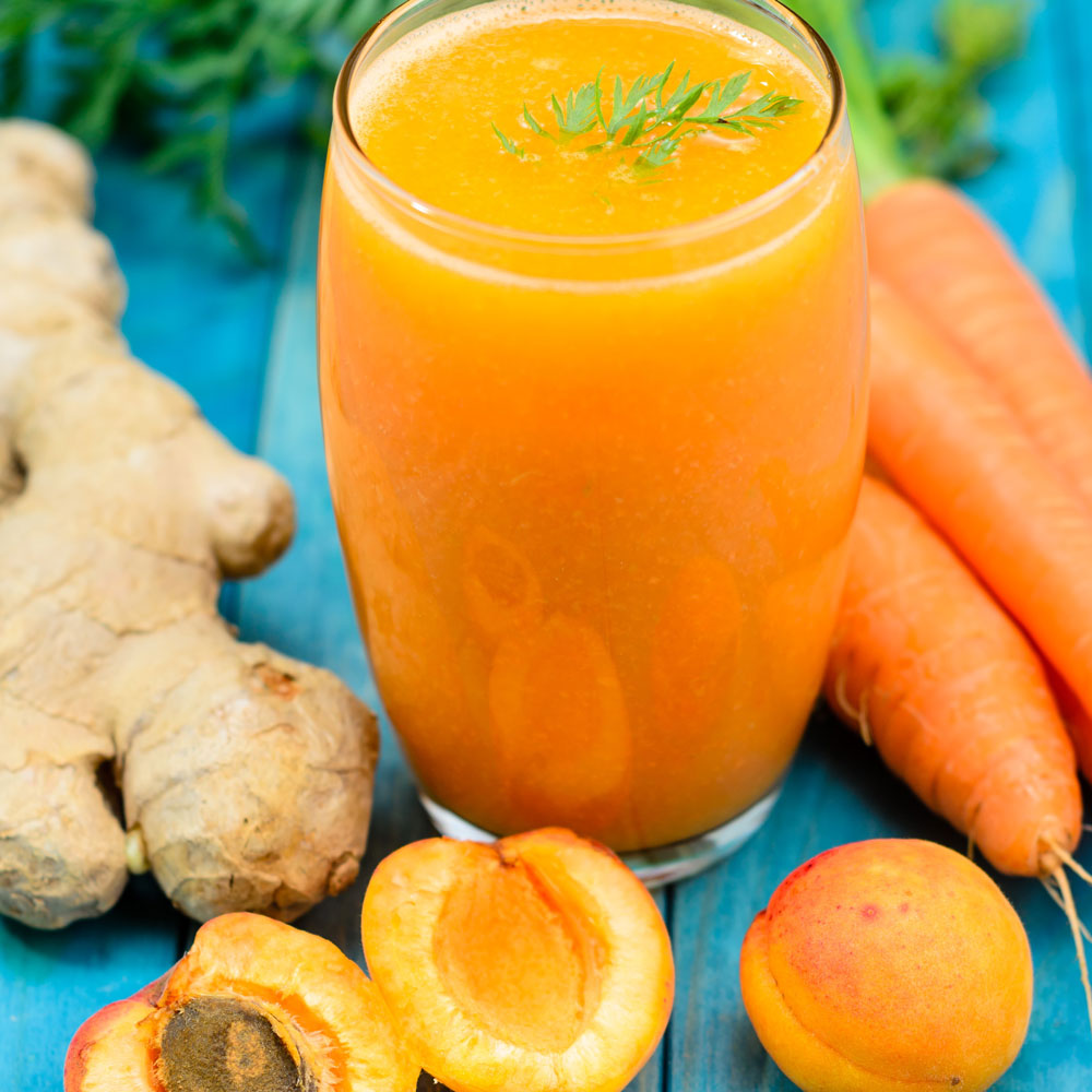fresh juice with carrot parsley apricot and ginger