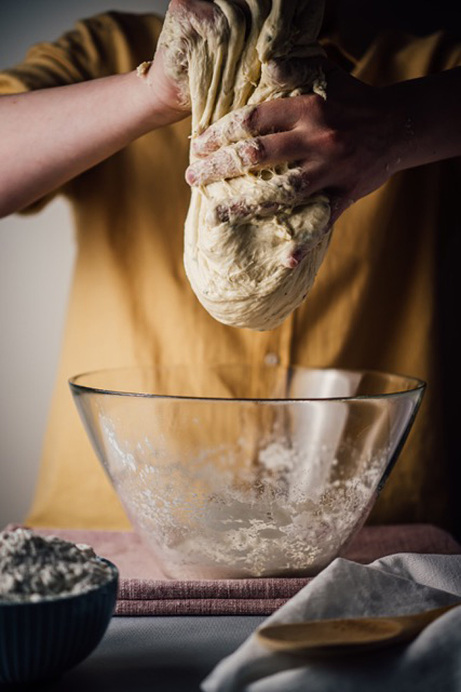 kneading sourdough