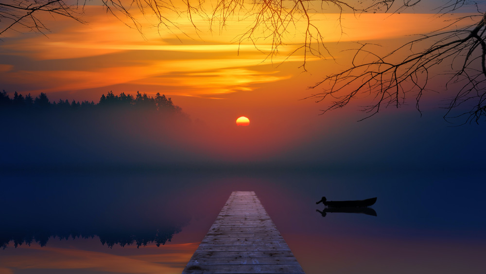 sunset at the dock on a peaceful lake