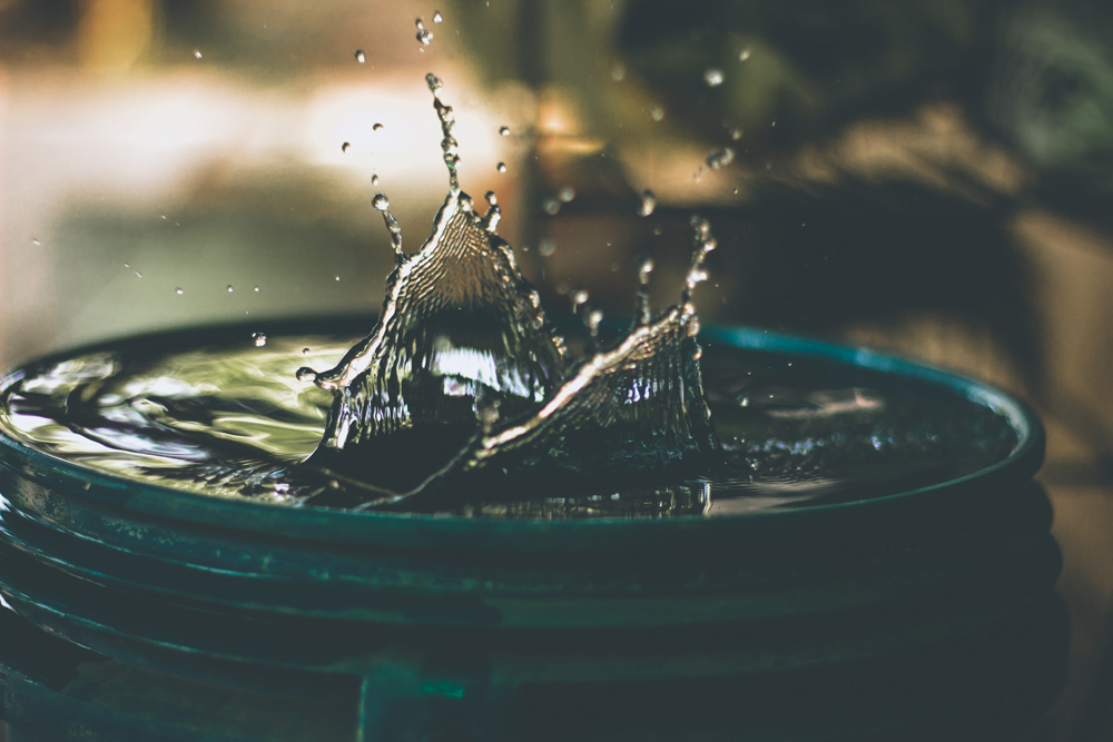 water splashing in bucket