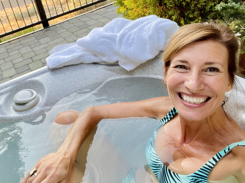 Nicole Apelian in a hot tub