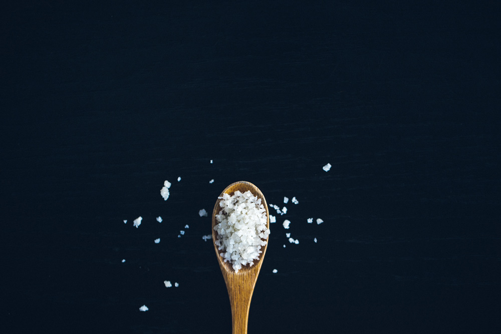 wooden spoon with coarse salt
