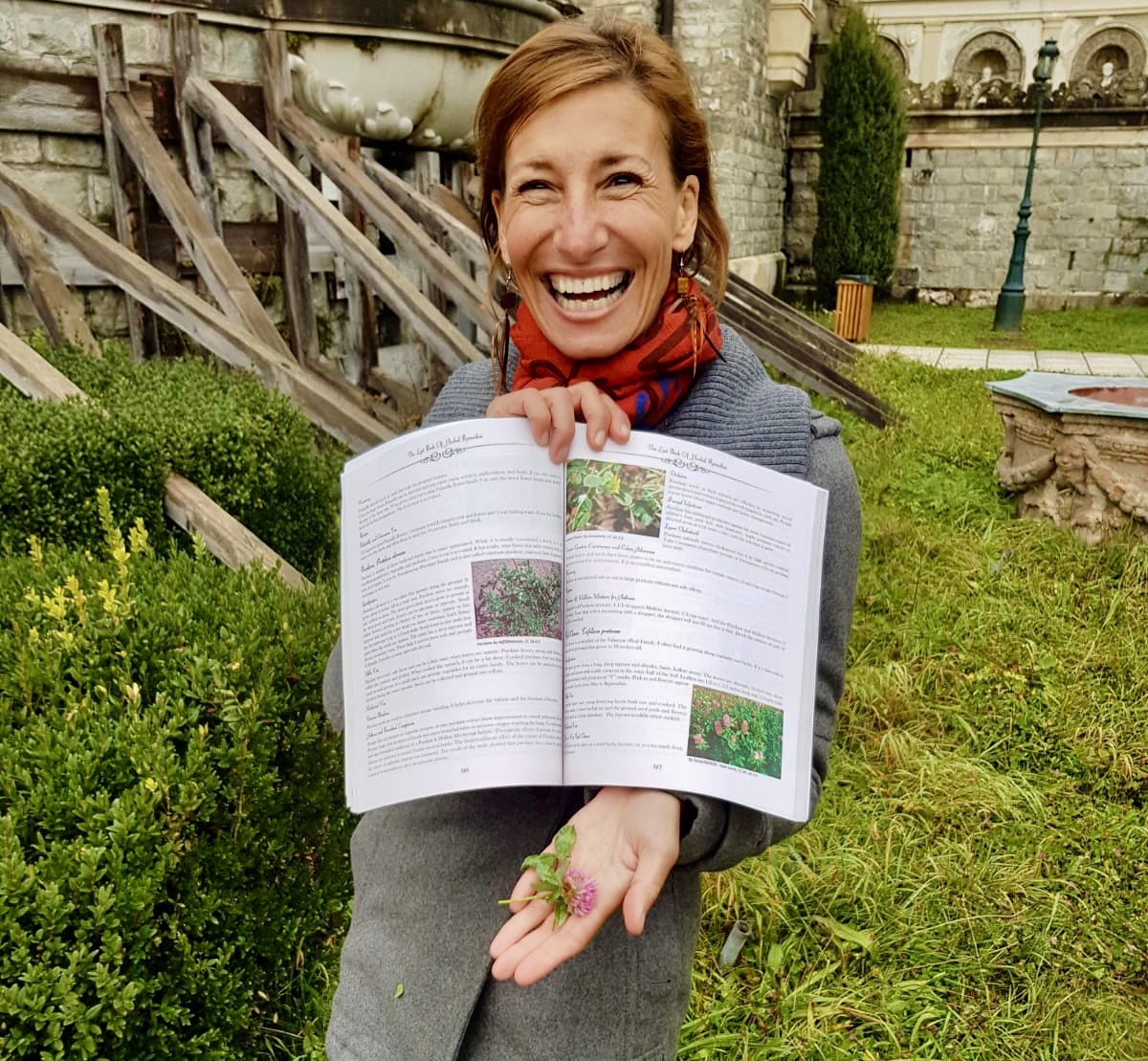 Nicole Apelian in Romania with book herbal remedies and wild plants