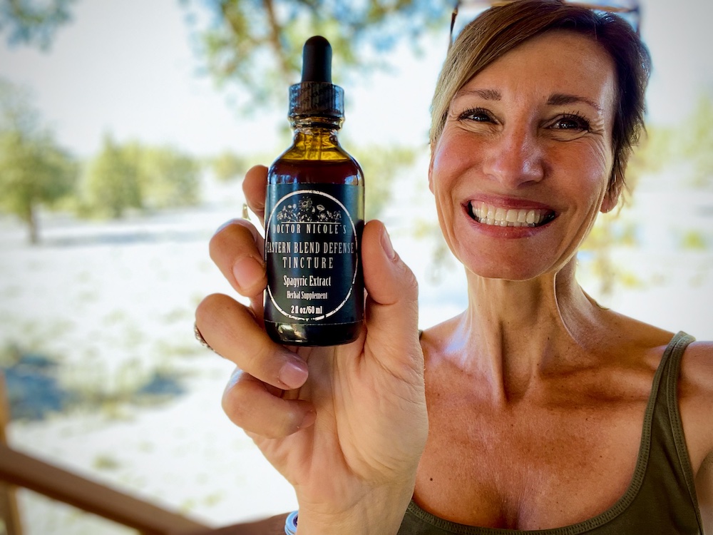 Nicole Apelian holding Eastern Blend Tincture