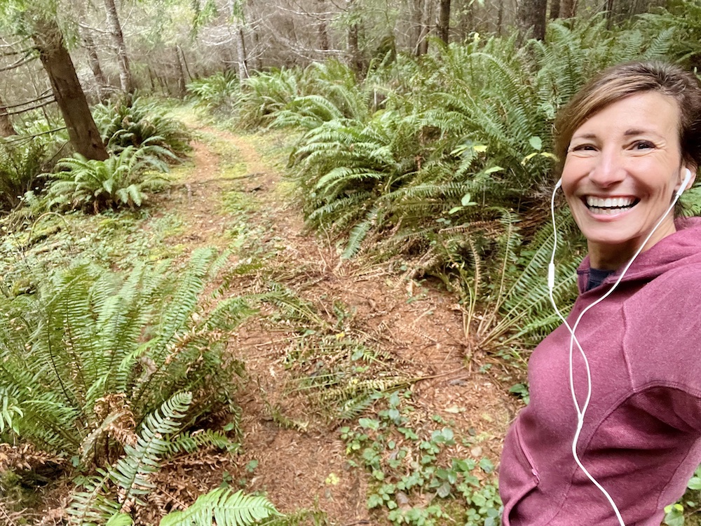 Nicole Apelian trail running wearing dovetail sweatshirt