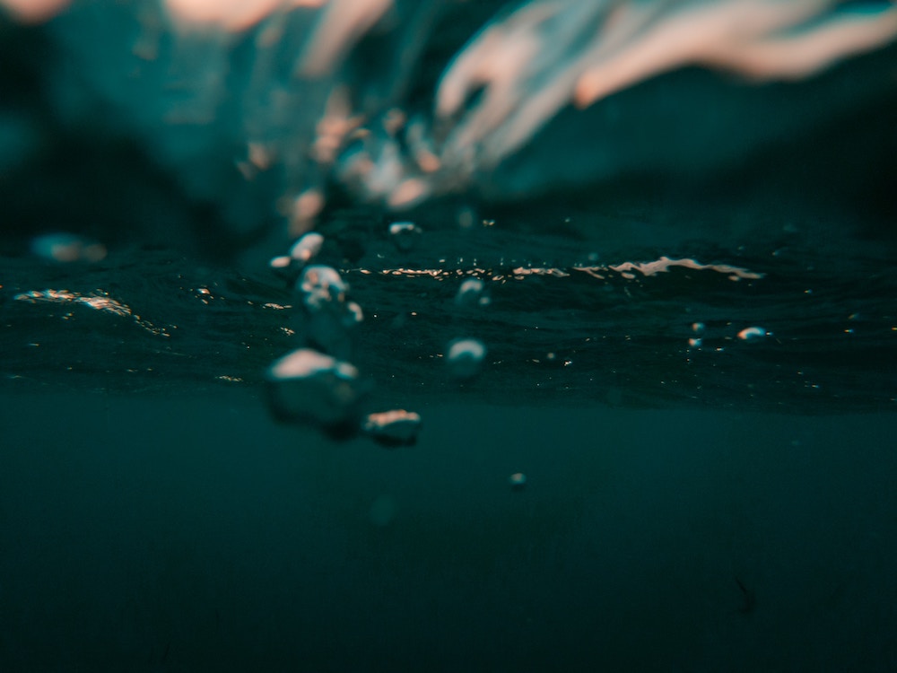 Bubbles in blue water