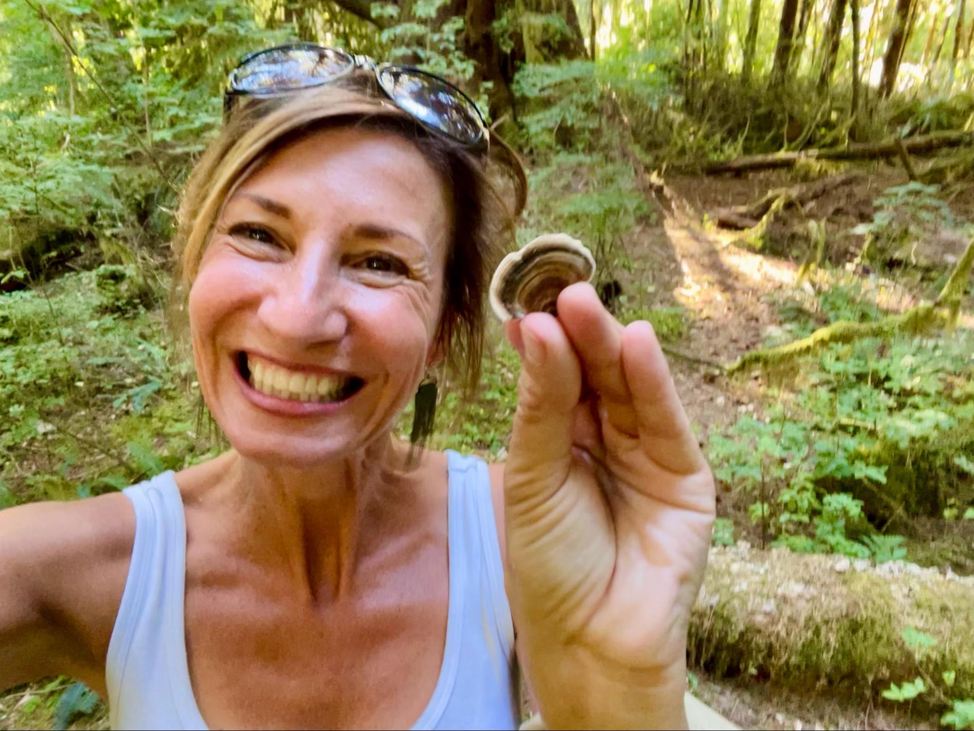 Nicole Apelian holding turkey tail mushroom