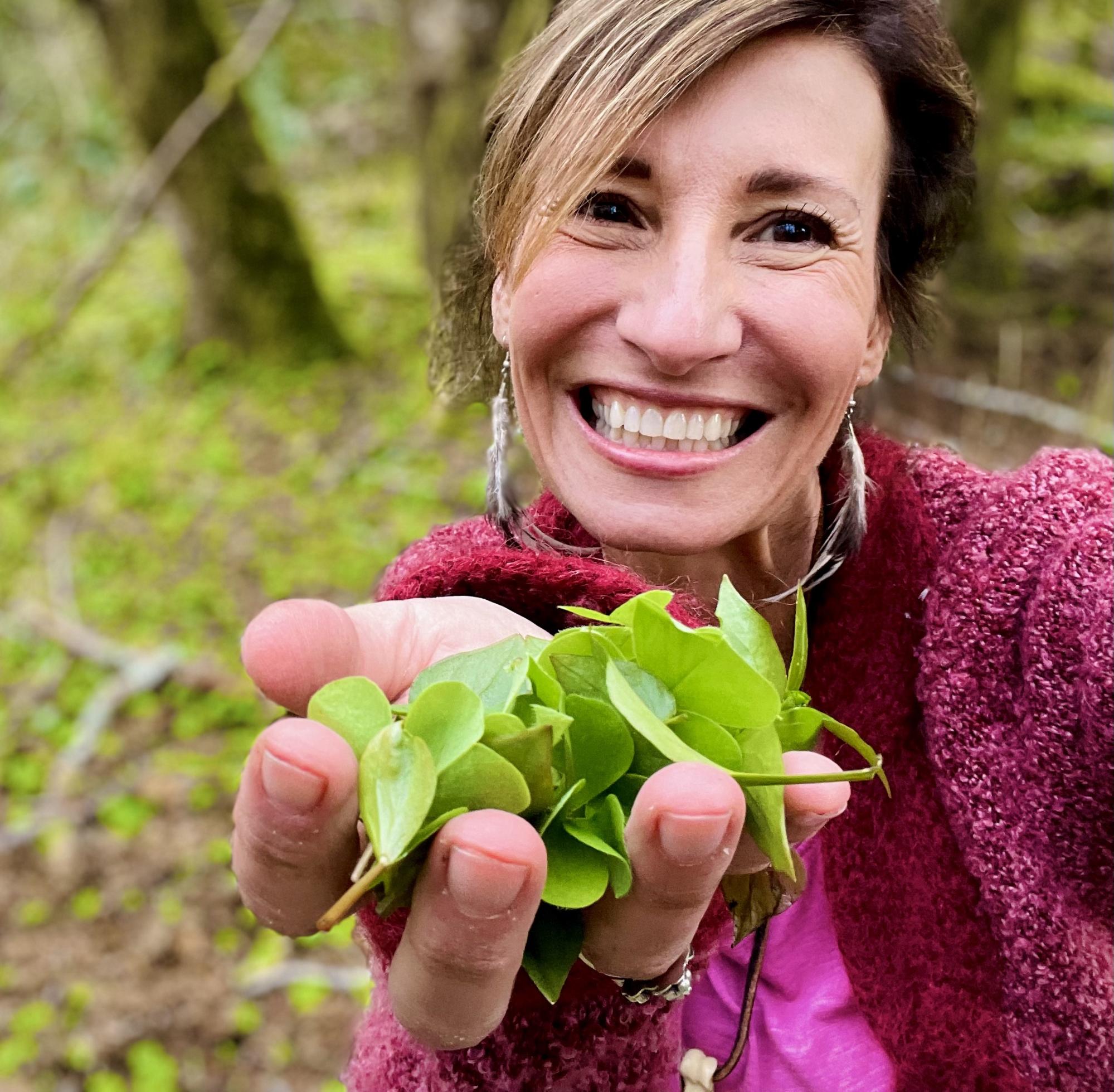 Nicole Apelian with handful of foraged plantain