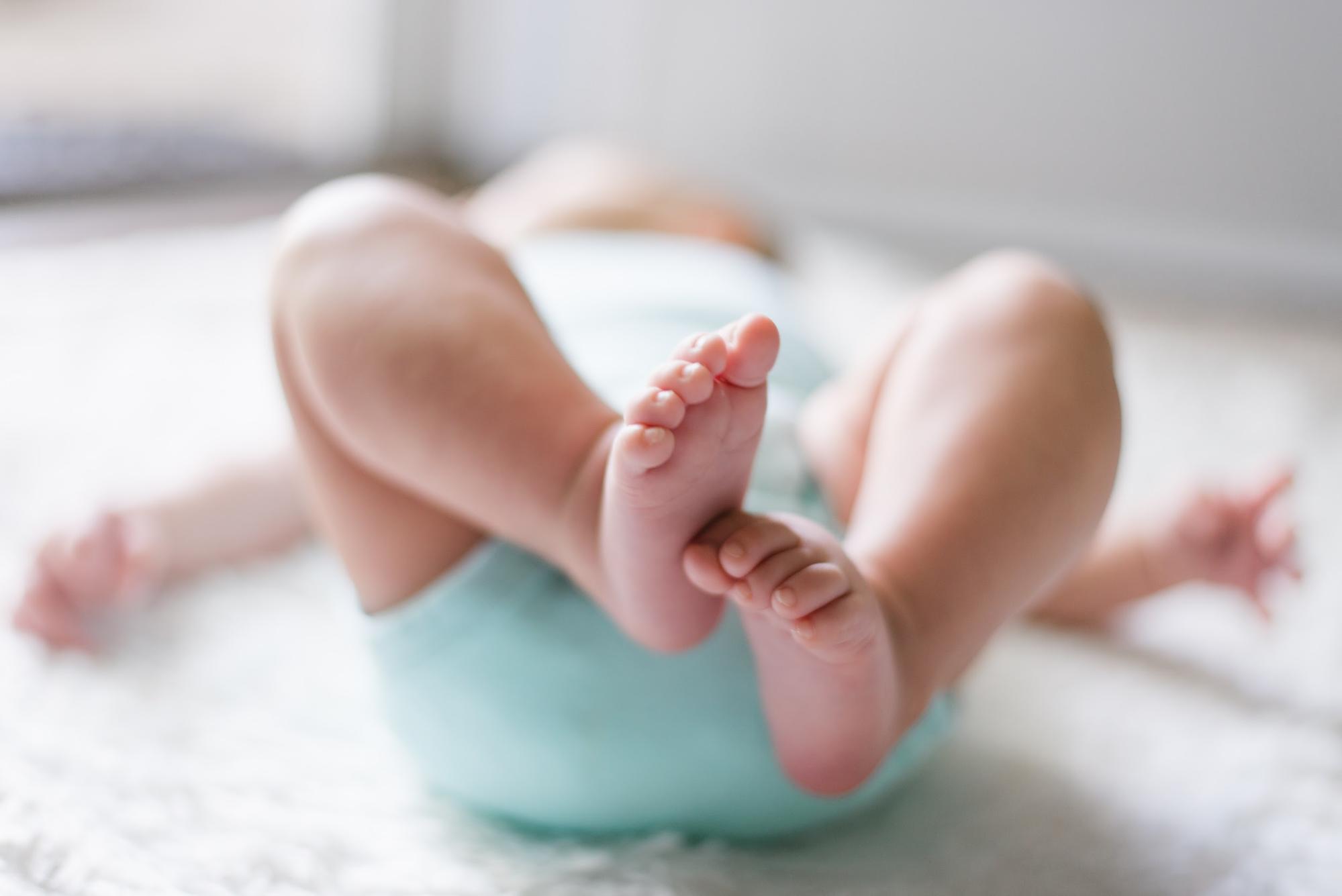 baby lying on the floor