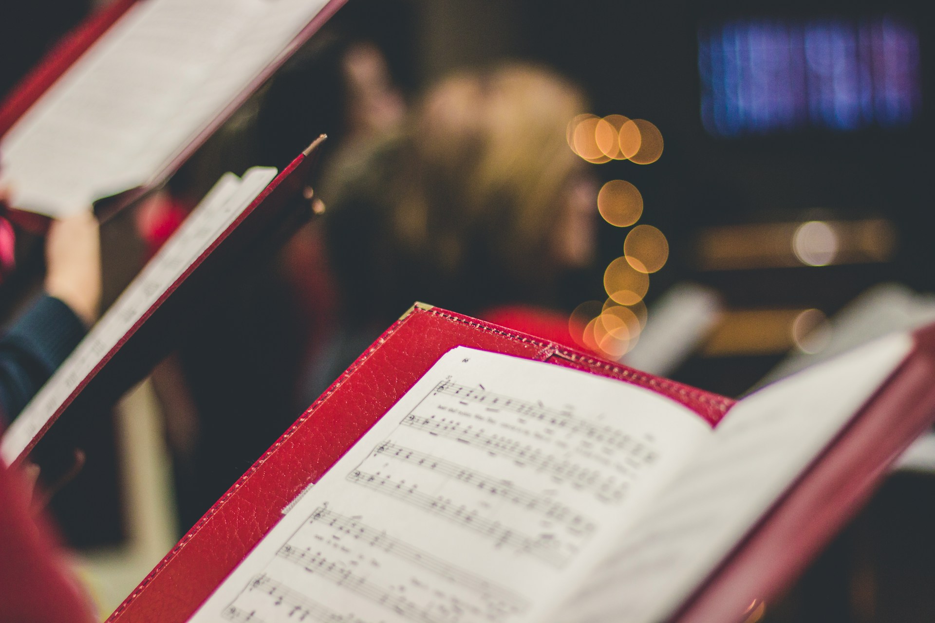 closeup of sheet music in choir