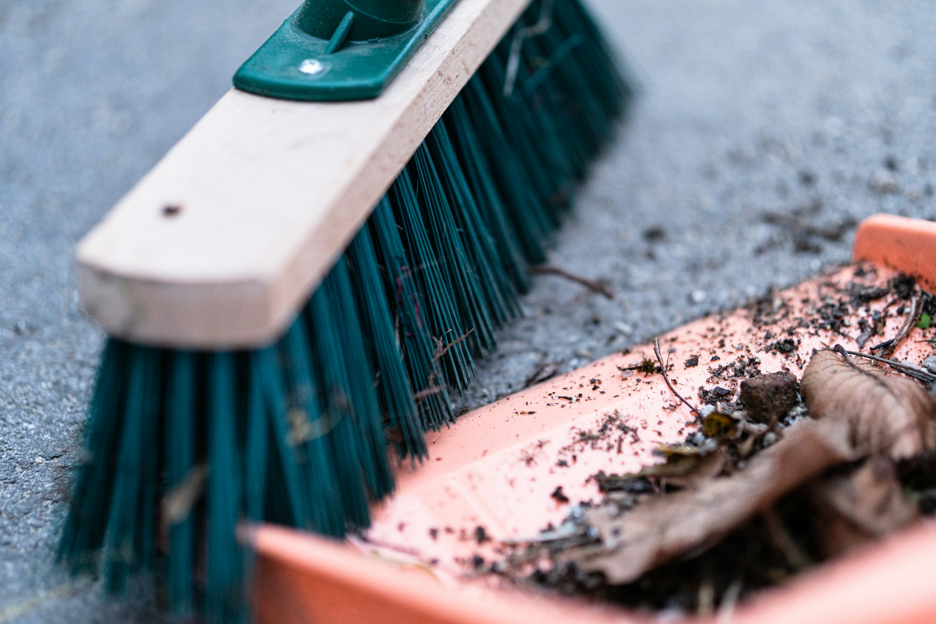 push broom sweeping dustpan