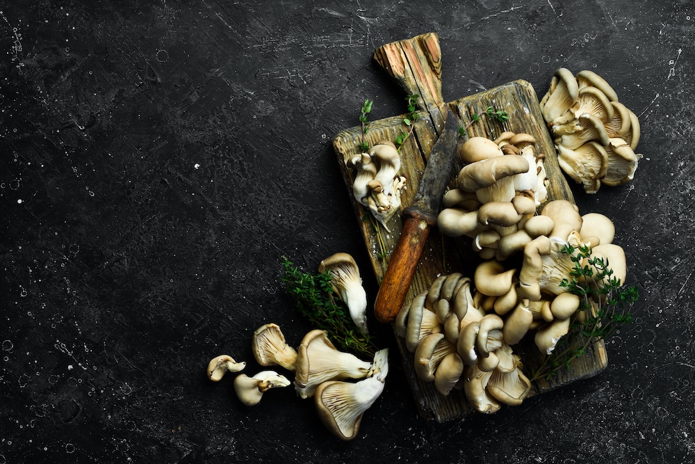 Maitake Mushroom on black stone