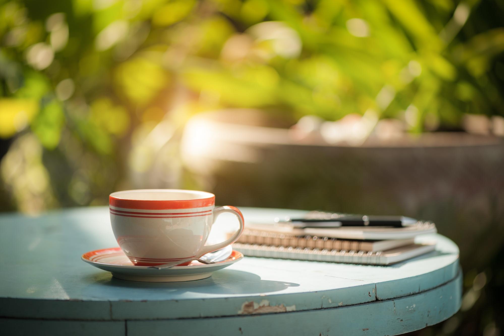 coffee cup on a table outdoors