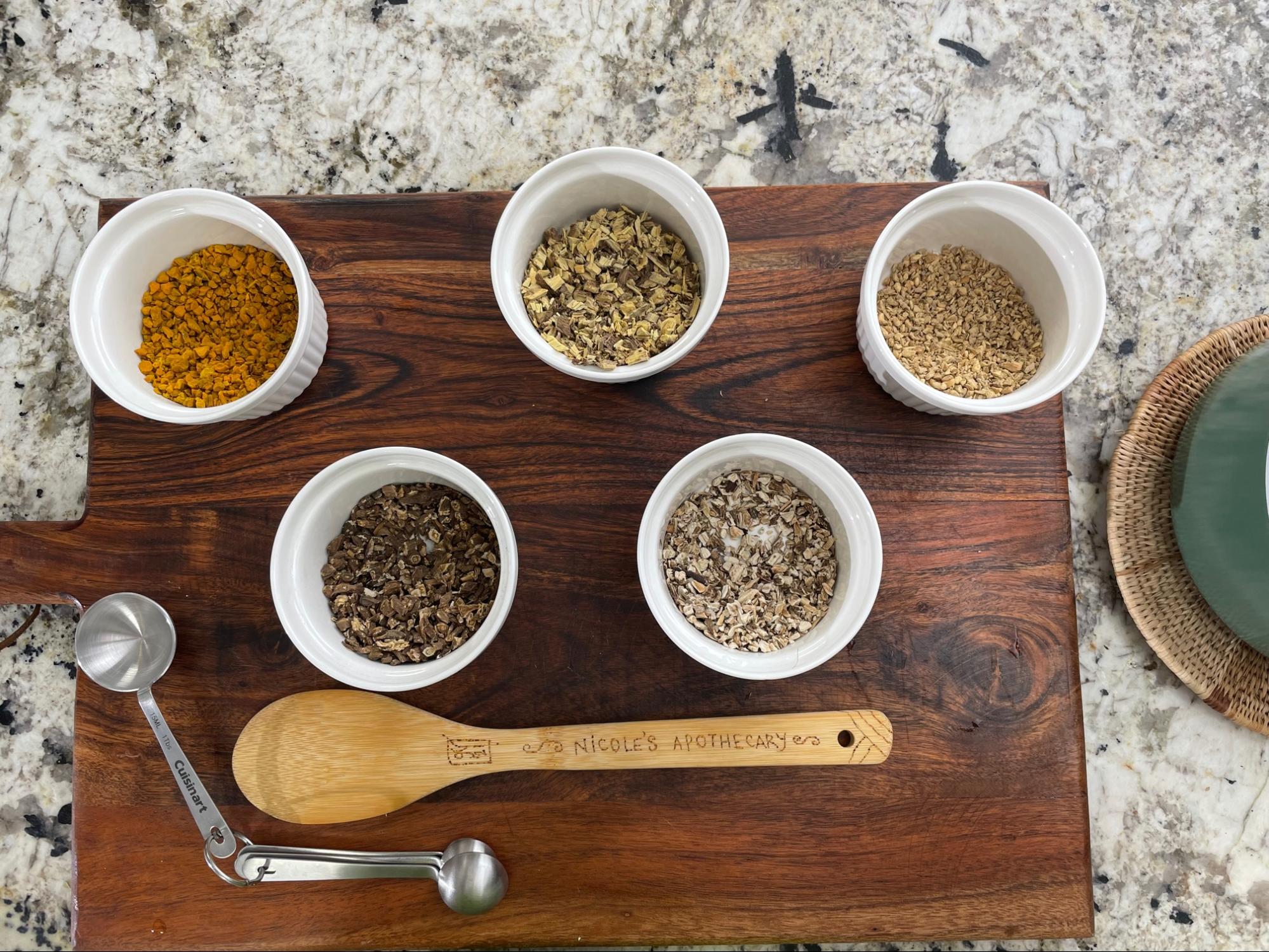 dried herbs in bowls