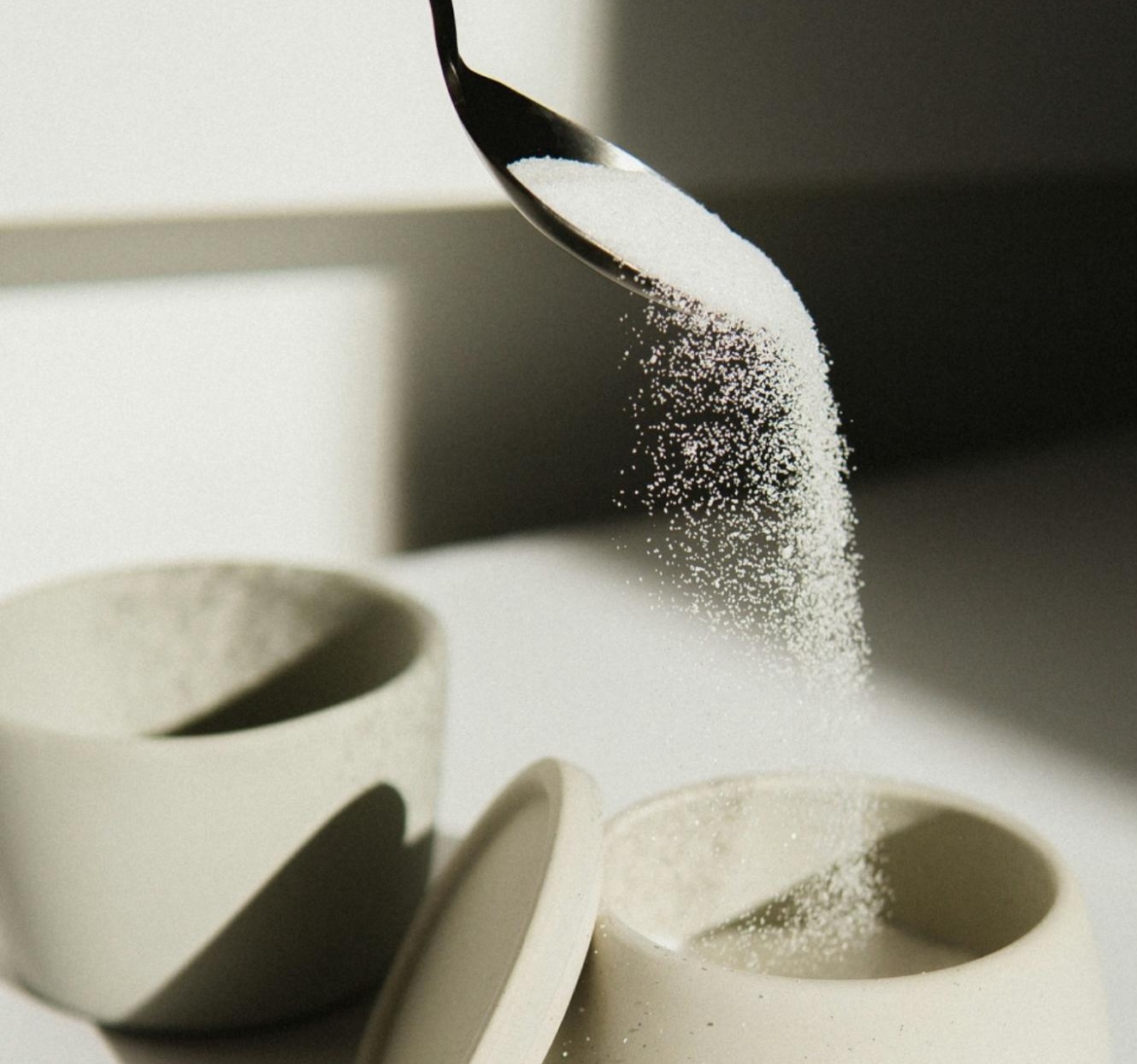 pouring sugar pouring sugar