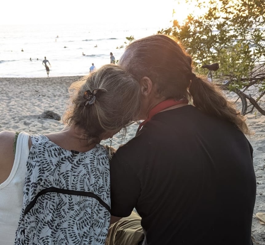 couple sitting on beach