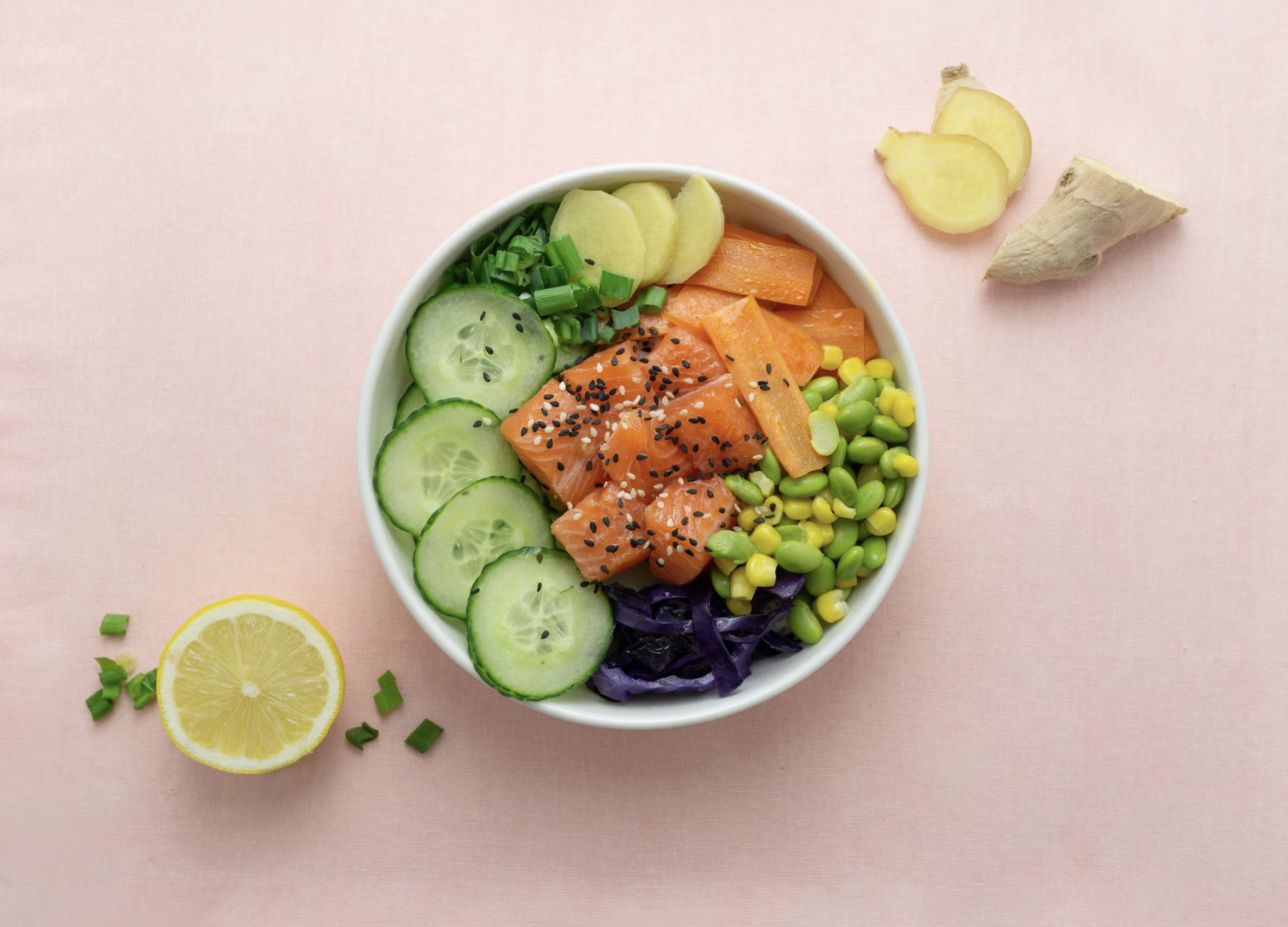 bowl of fresh, clean food with vegetables and salmon with omega 3s